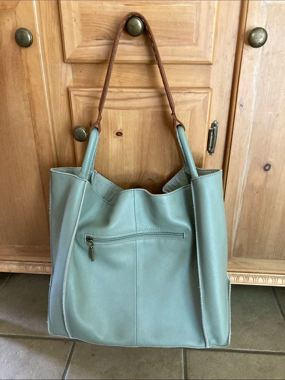 The Sak Leather Tote Bag in Light Sage with Contrast Brown Handles